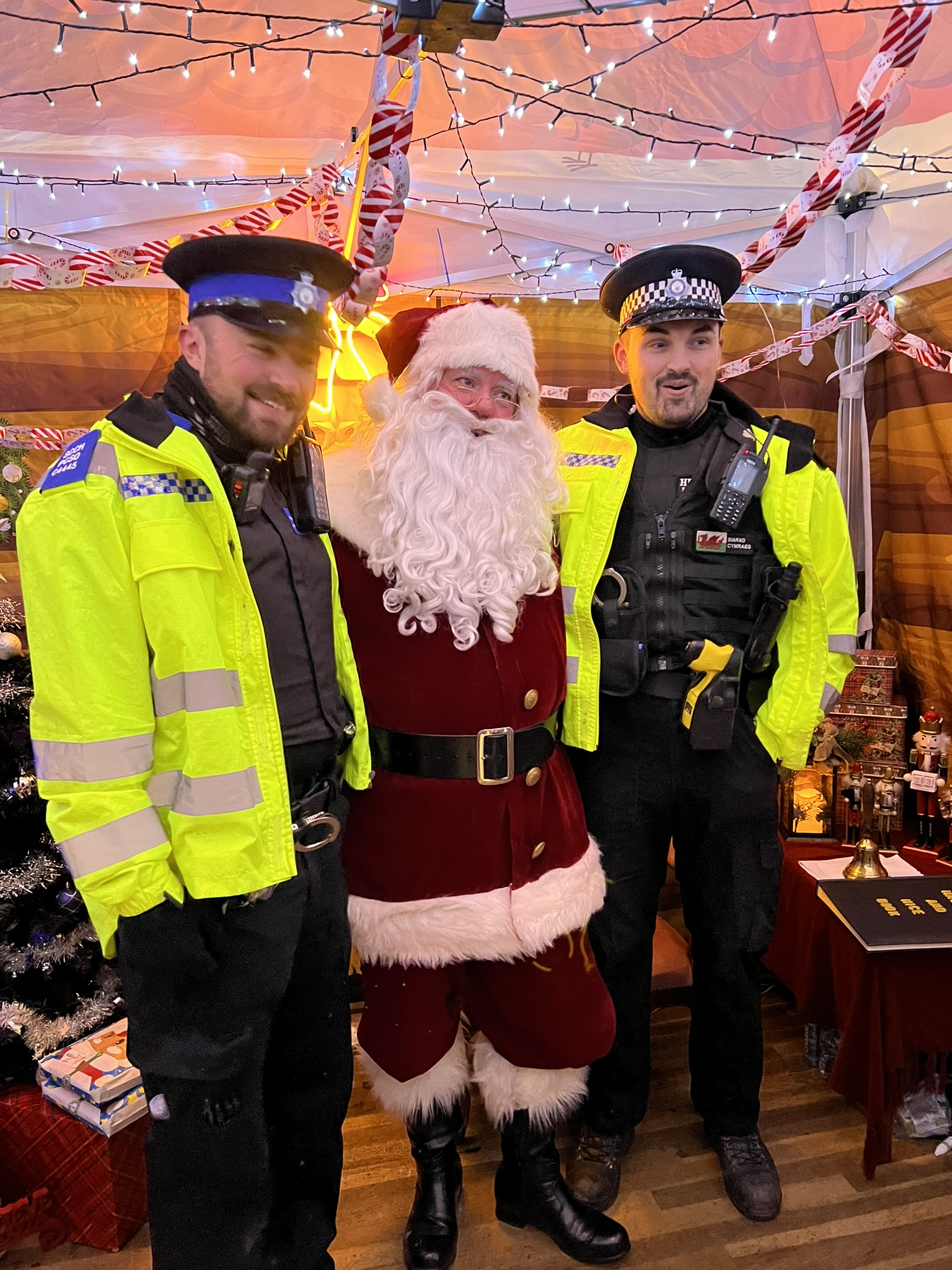 Santa with local police officers at Jingle Bell Bash